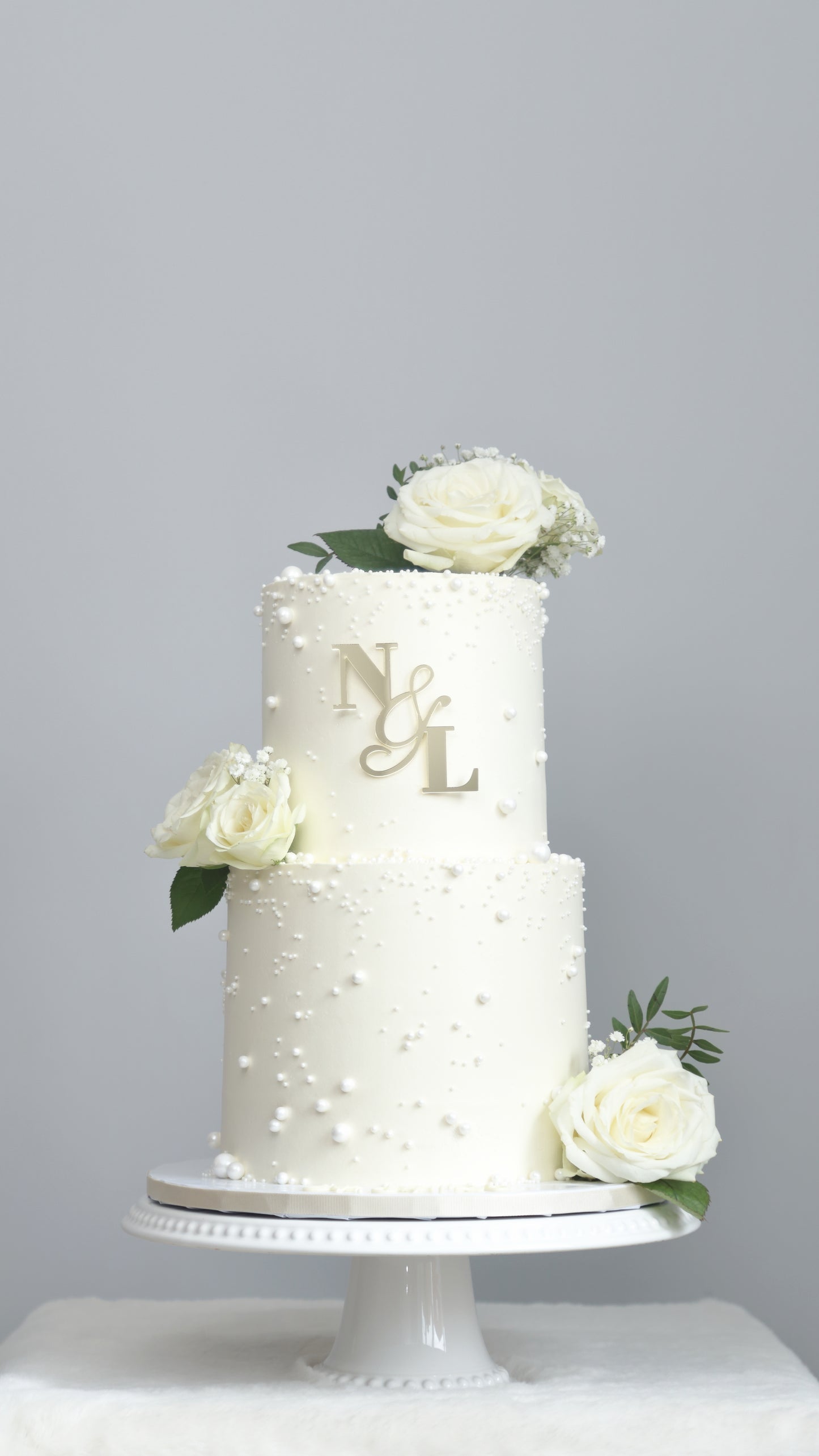 Two-Tier White Pearl Wedding Cake